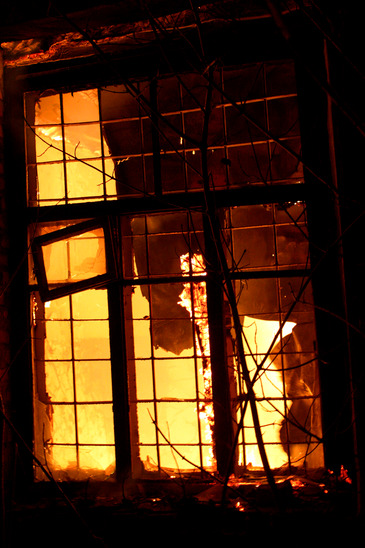 house fire behind windows