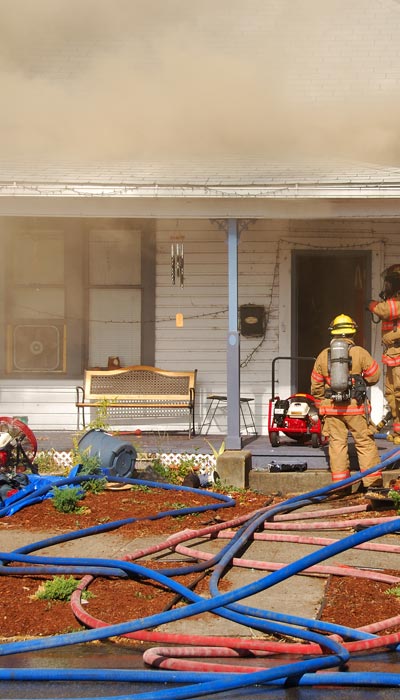 house fire with smoke and soot damage
